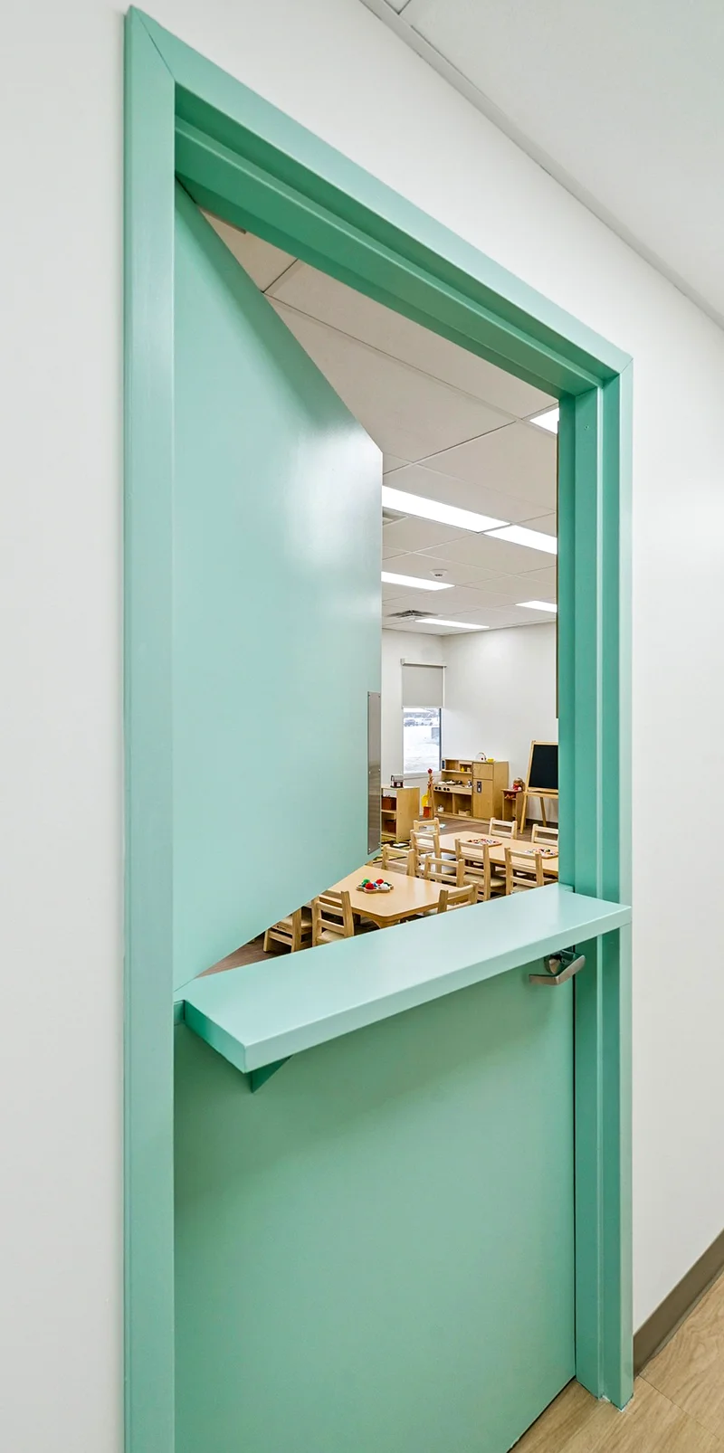 Look through a gable door to Lakeland Child Care North Barrie room.